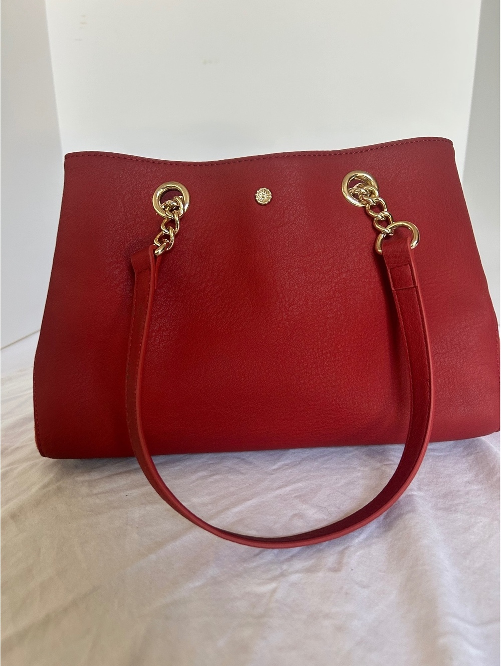 Lauren Conrad Red Leather Handbag with Gold Chain Strap and Magnetic Closure